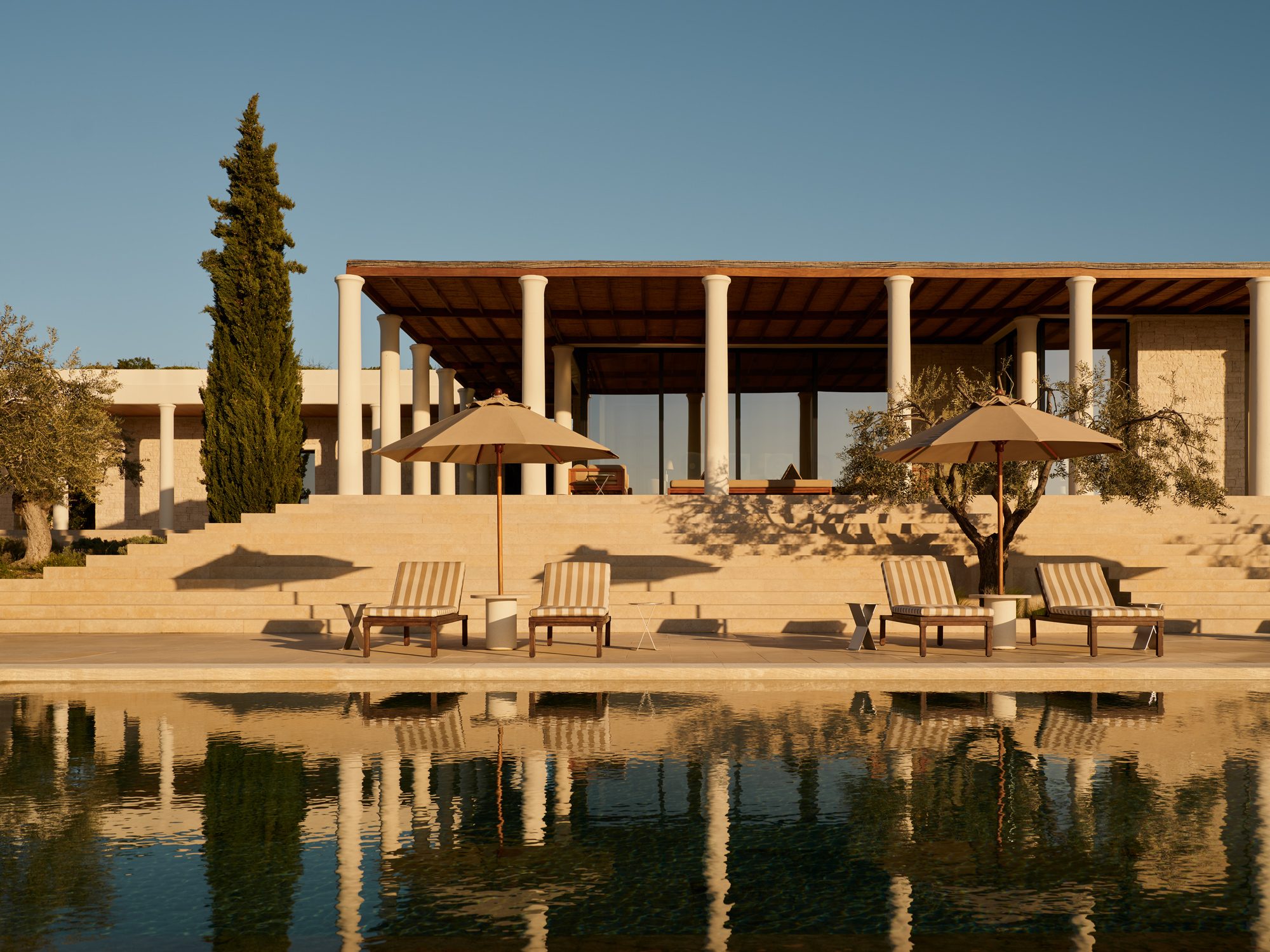 The reflecting pool and the colonnaded pavilion at Amanzoe