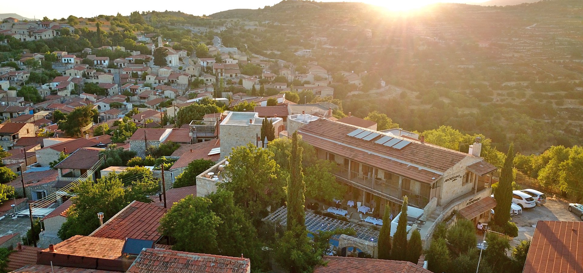 Apokryfo and the village of Lofou in the Troodos foothills at sunset