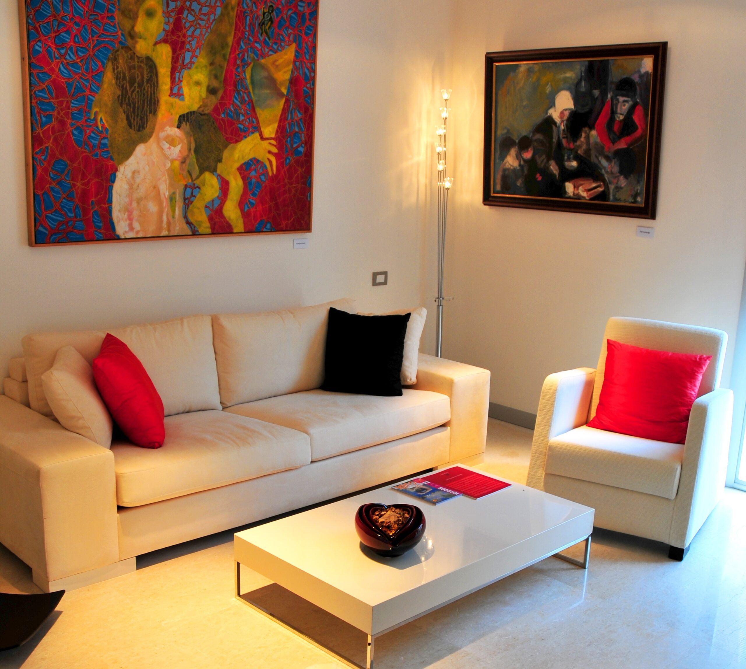 A duplex suite living room set with contemporary Turkish canvases