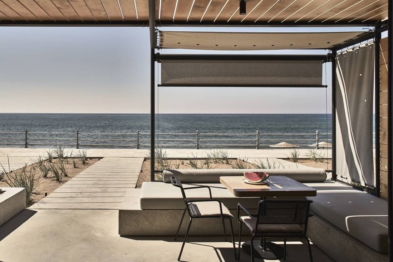 A suite patio opening to the sea
