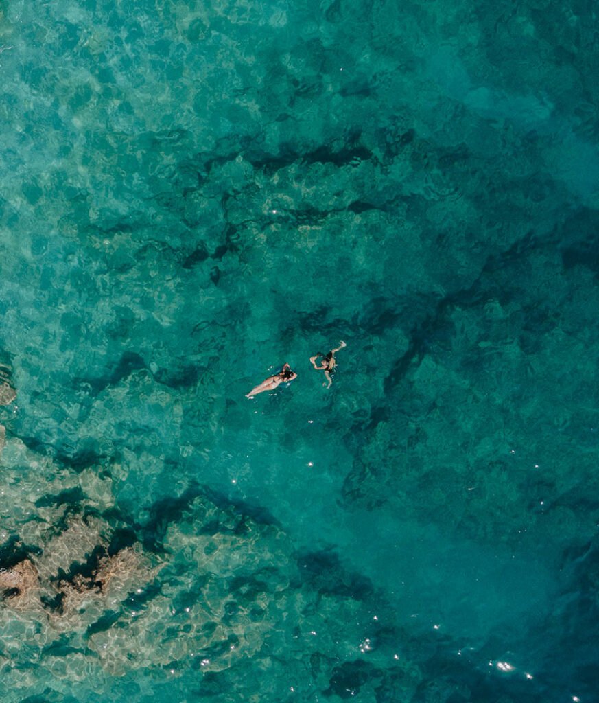 Swimmer in the clear turquoise Ionian off Dhërmi