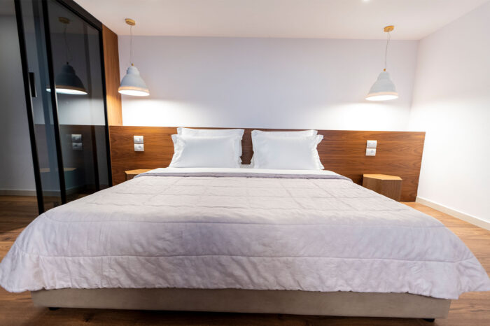 Bright duplex suite bedroom at Empire Beach Resort