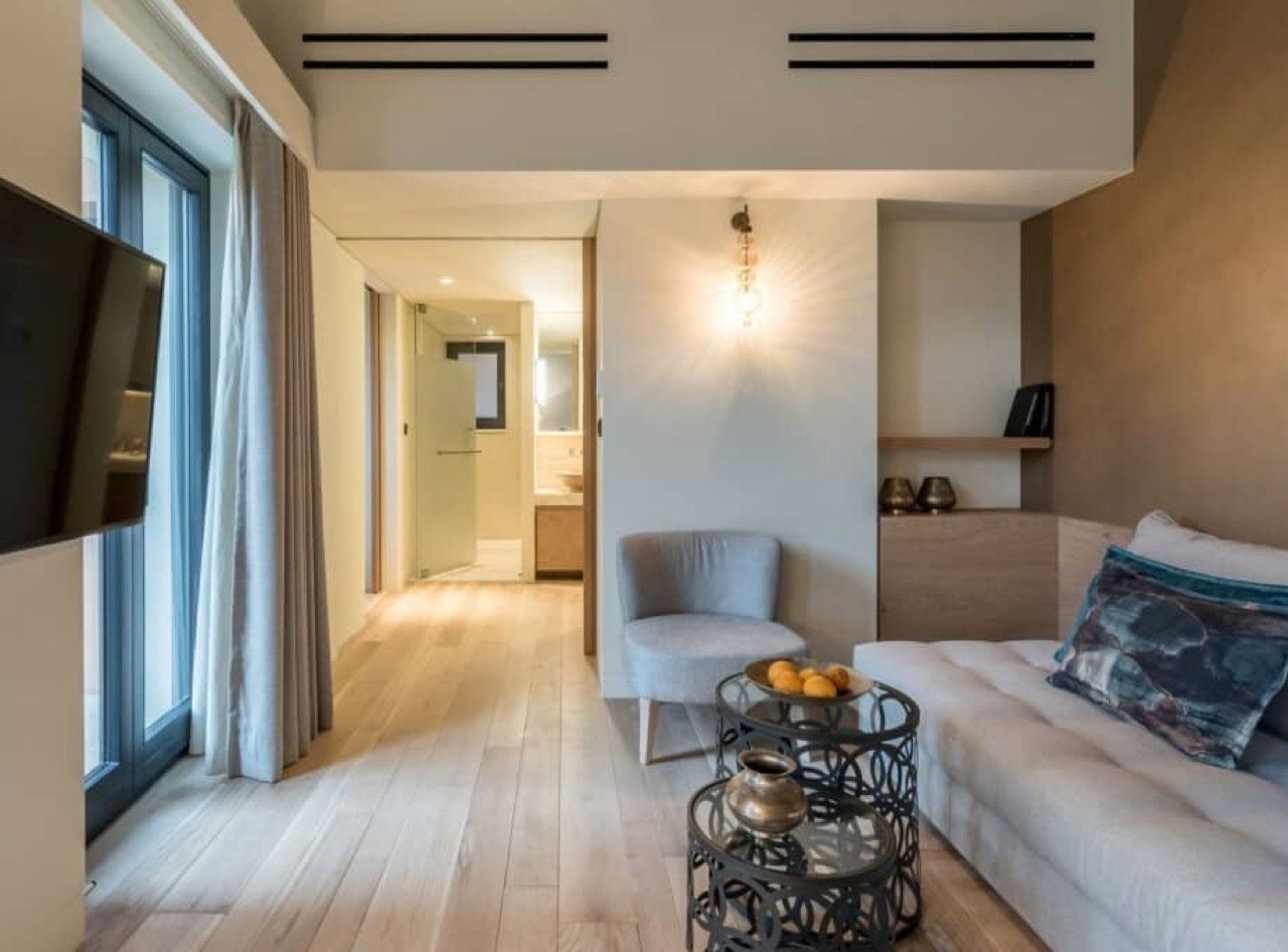 A suite in pale oak and soft light