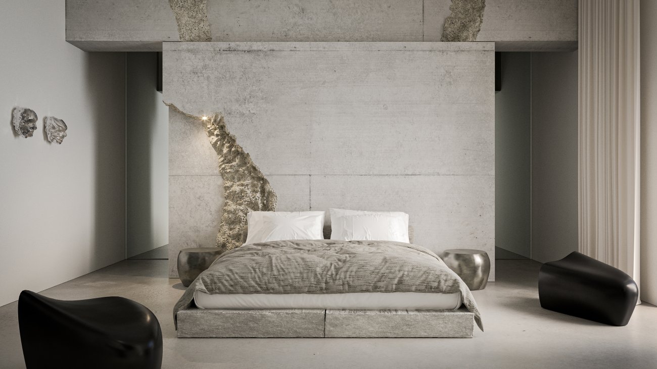 A sculptural suite in poured concrete with a boulder set into the headboard