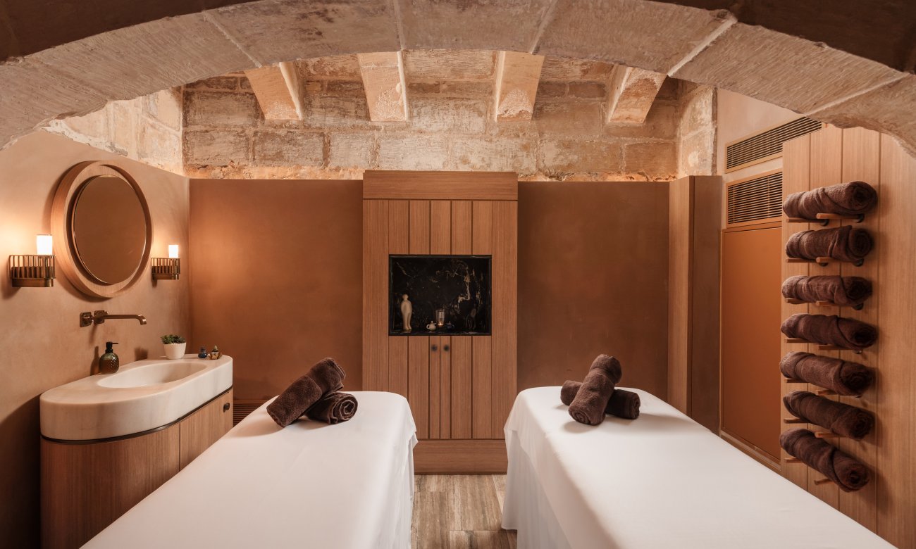 A treatment room in the Essensi spa, set under the original stone vaults