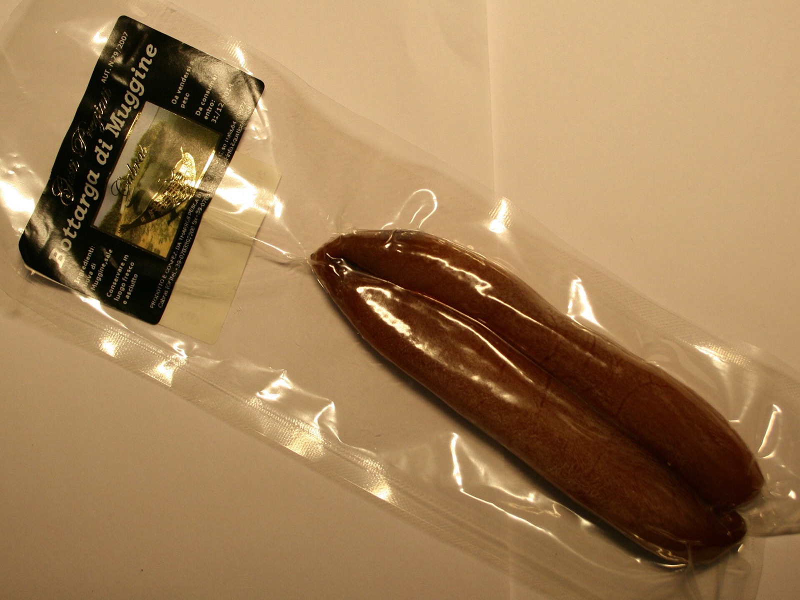 In a brackish lagoon on Sardinia's west coast, grey mullet roe is salted, pressed and drie