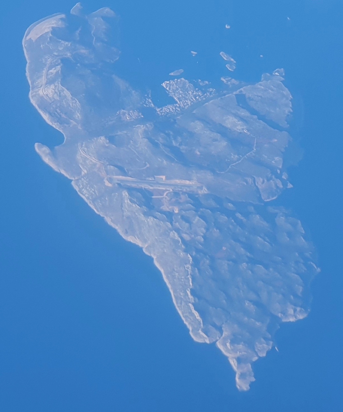 Aerial view of Kastellorizo town wrapped around its harbour