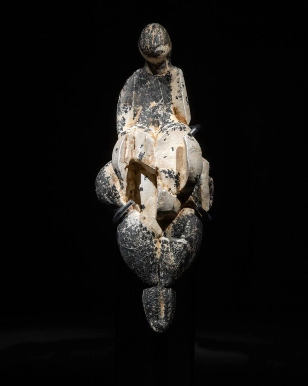 A replica of the Venus of Lespugue, the mammoth-ivory figurine at the heart of the show