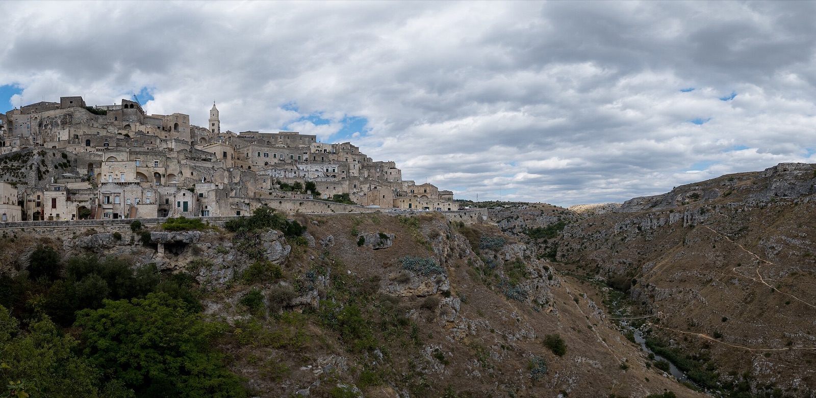 The Sassi of Matera rising in tiers of pale rock-cut houses