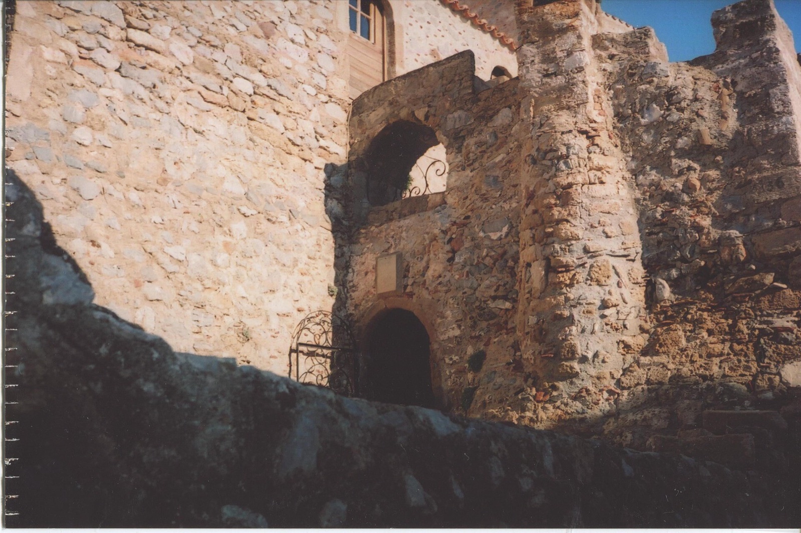 The low, angled gate in the sea wall