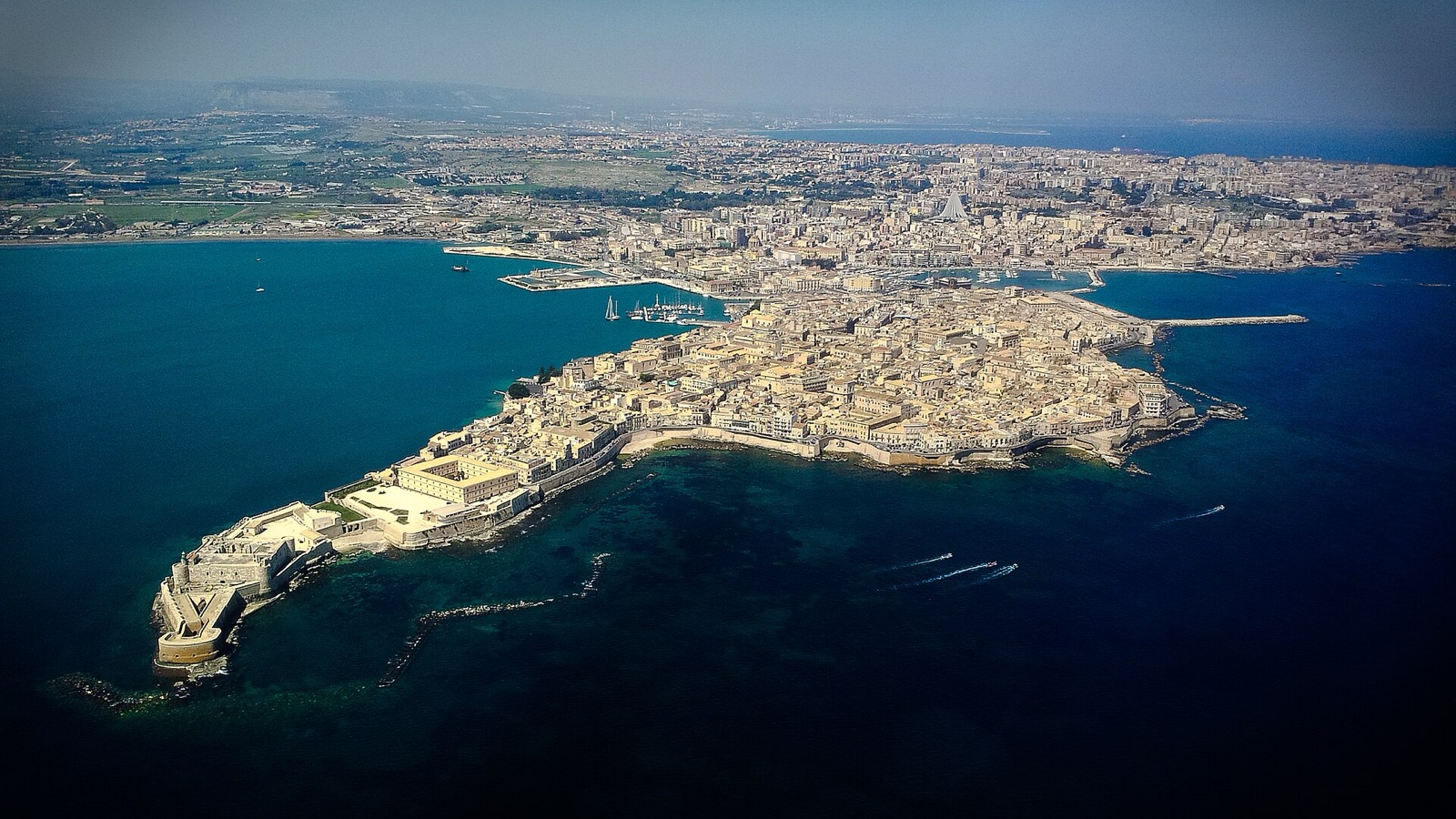 The oldest part of Syracuse is a small island you can walk in half an hour. Before the caf