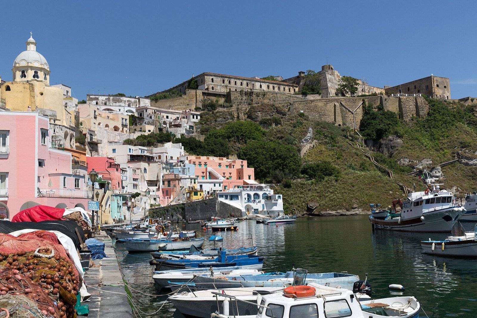 The fortified quarter of Terra Murata seen from the Corricella harbour, Procida