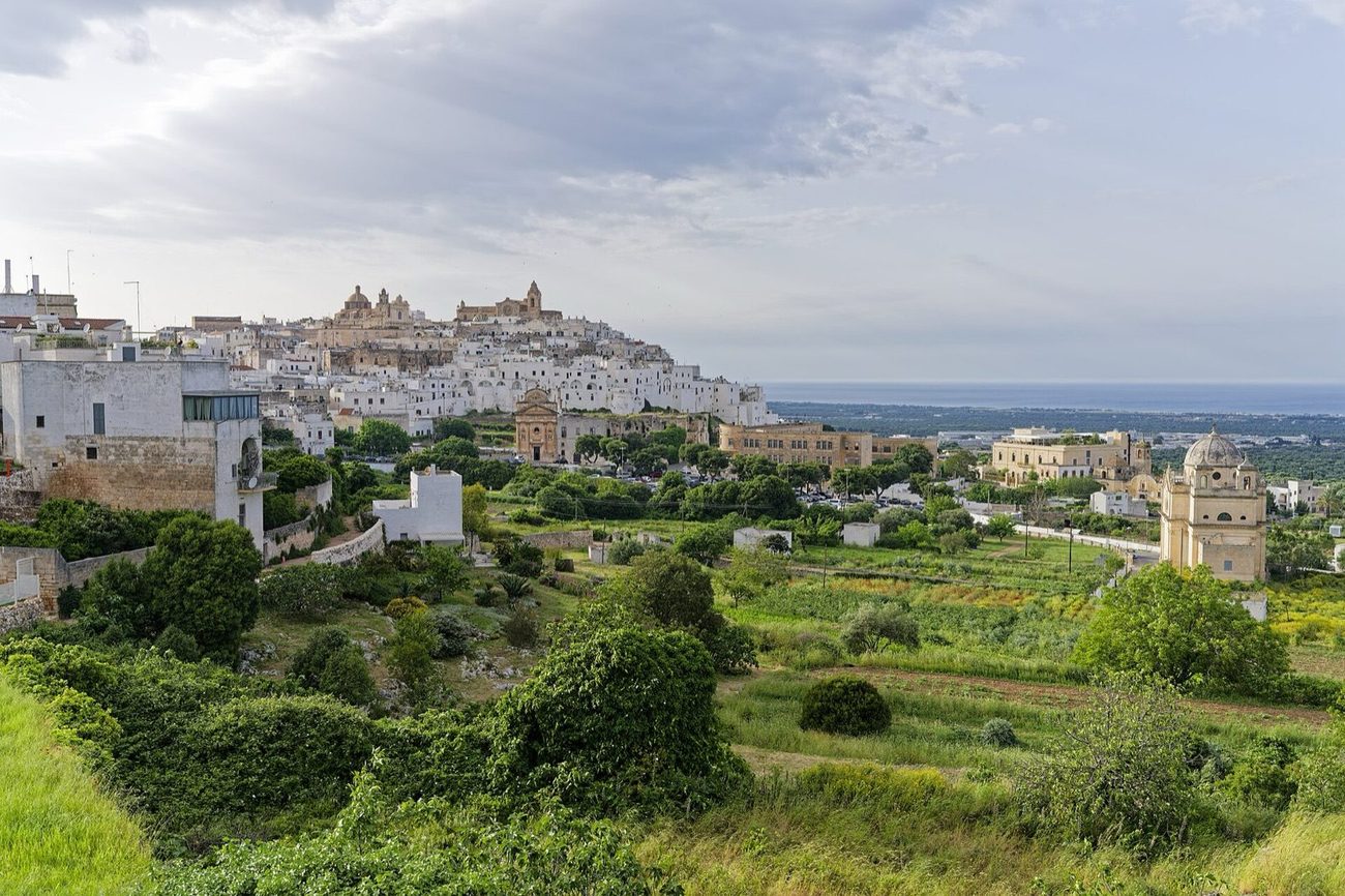 The white hill-town of Ostuni above the olive plains