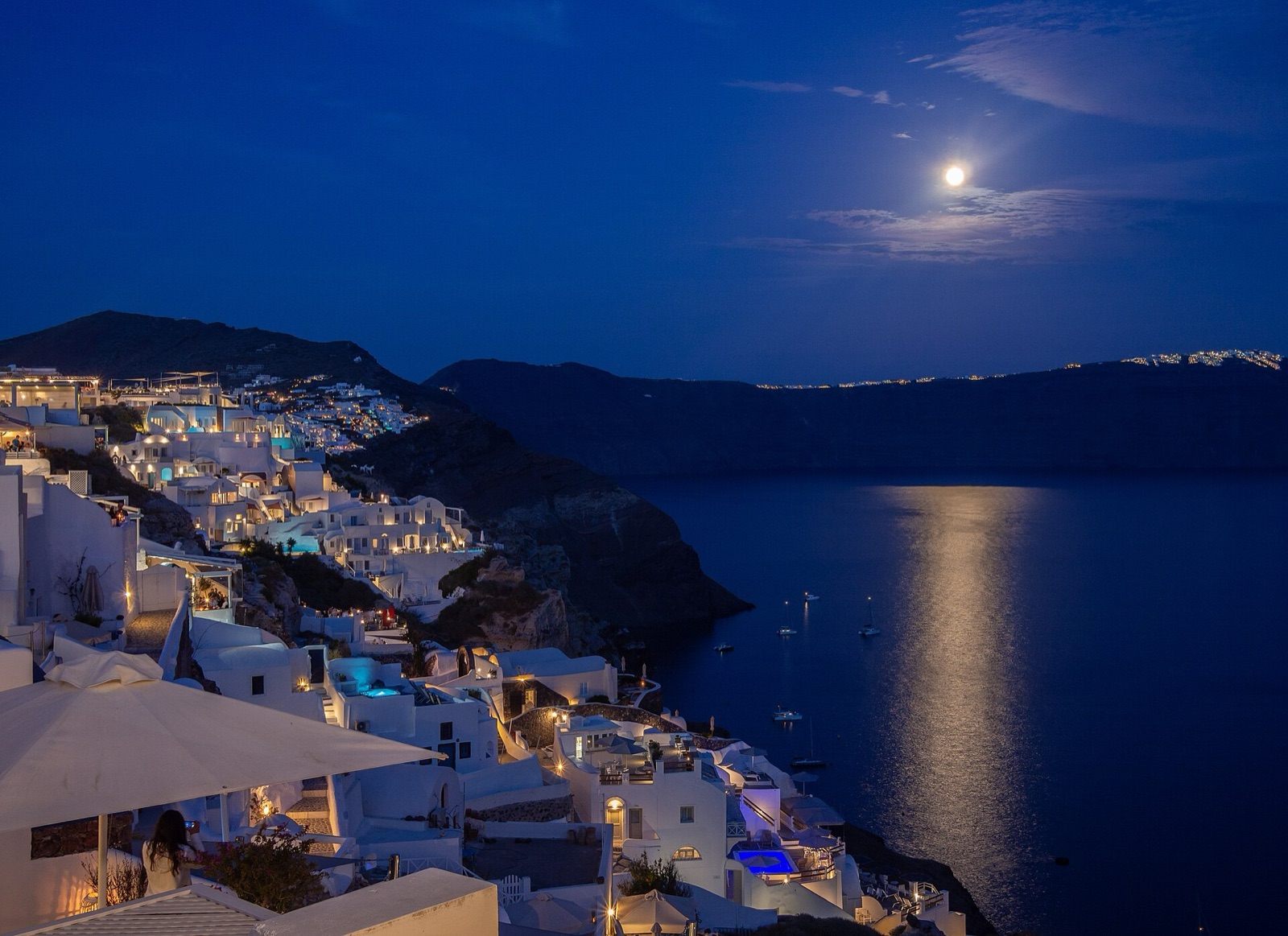 The caldera read as geology: one Bronze Age explosion that still decides the cliffs, the s
