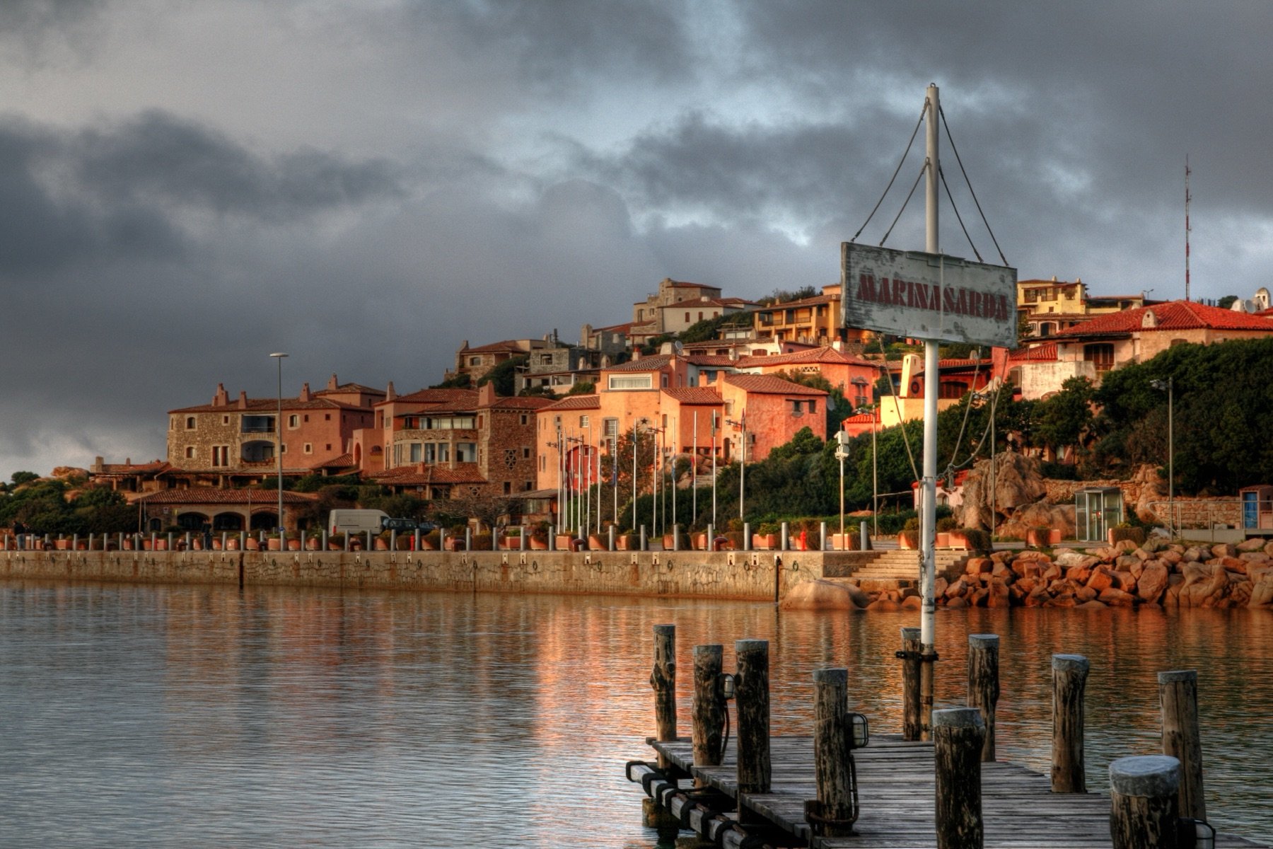 Yachts moored in the harbour at Porto Cervo, Sardinia, at sunset