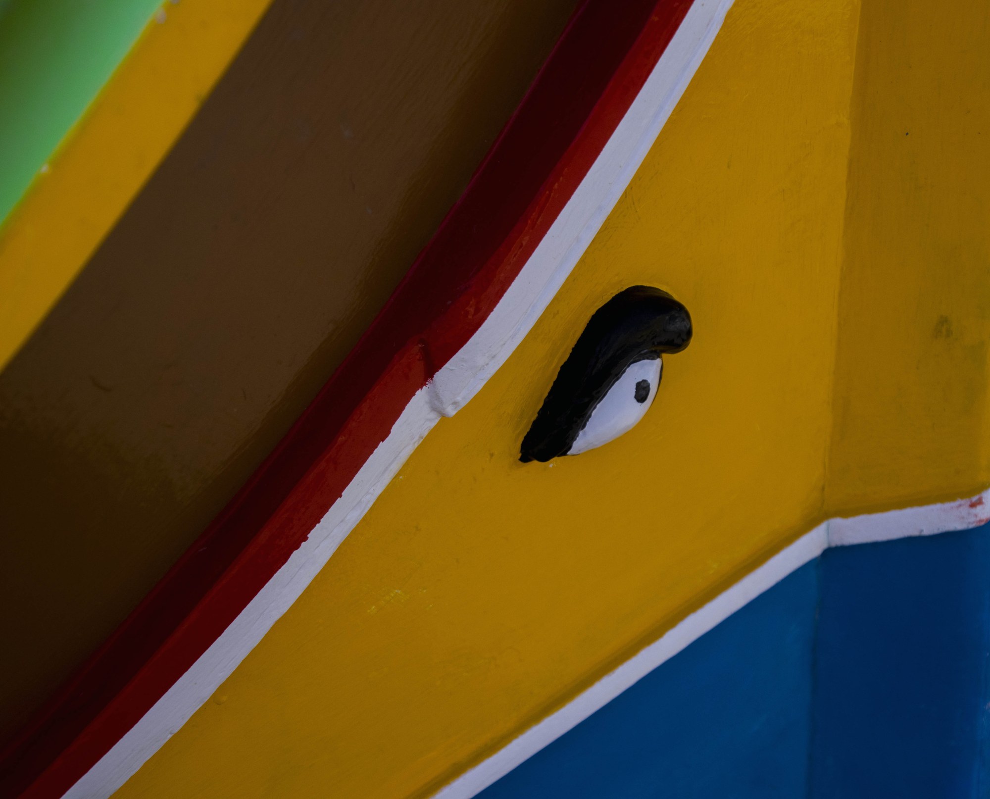 Close detail of the eye painted at a luzzu's prow