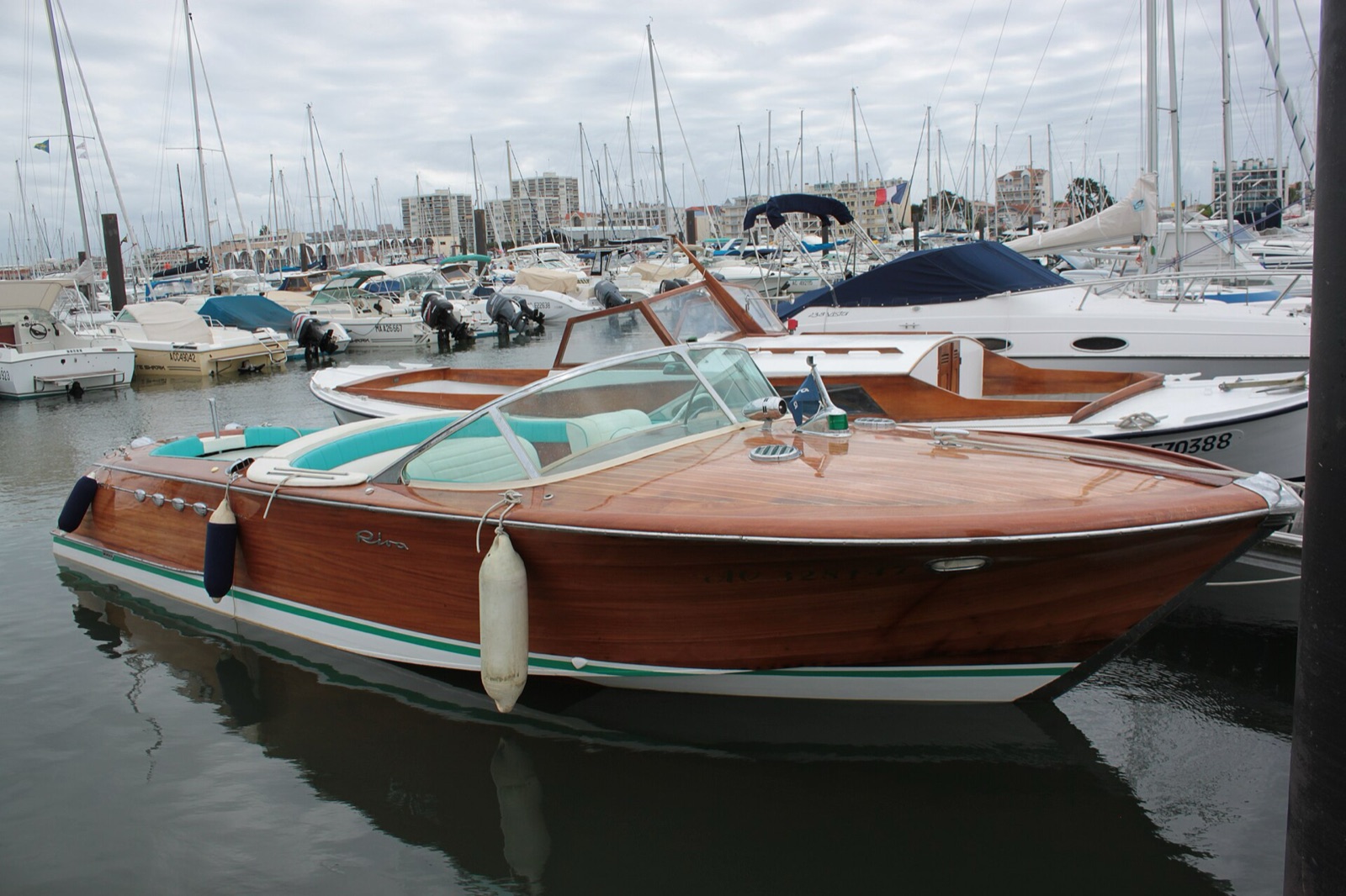 A Riva Aquarama moored in the harbour at Arcachon, France