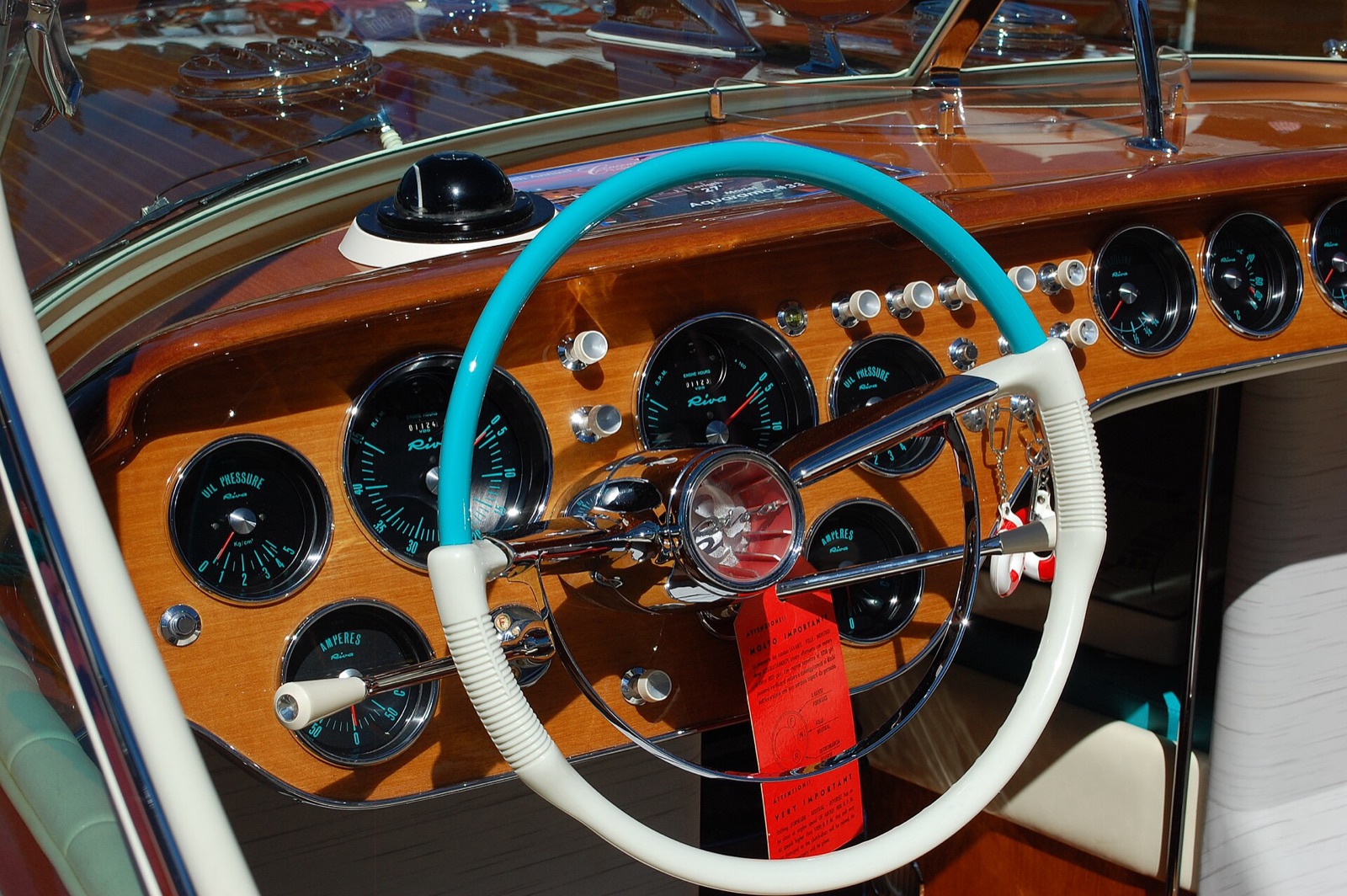 The steering wheel and cockpit of a Riva Super Aquarama