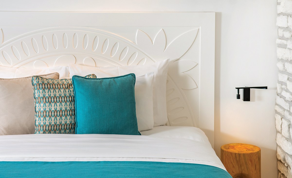 A suite in the Historic Building with thick walls and a rustic, pared-back finish