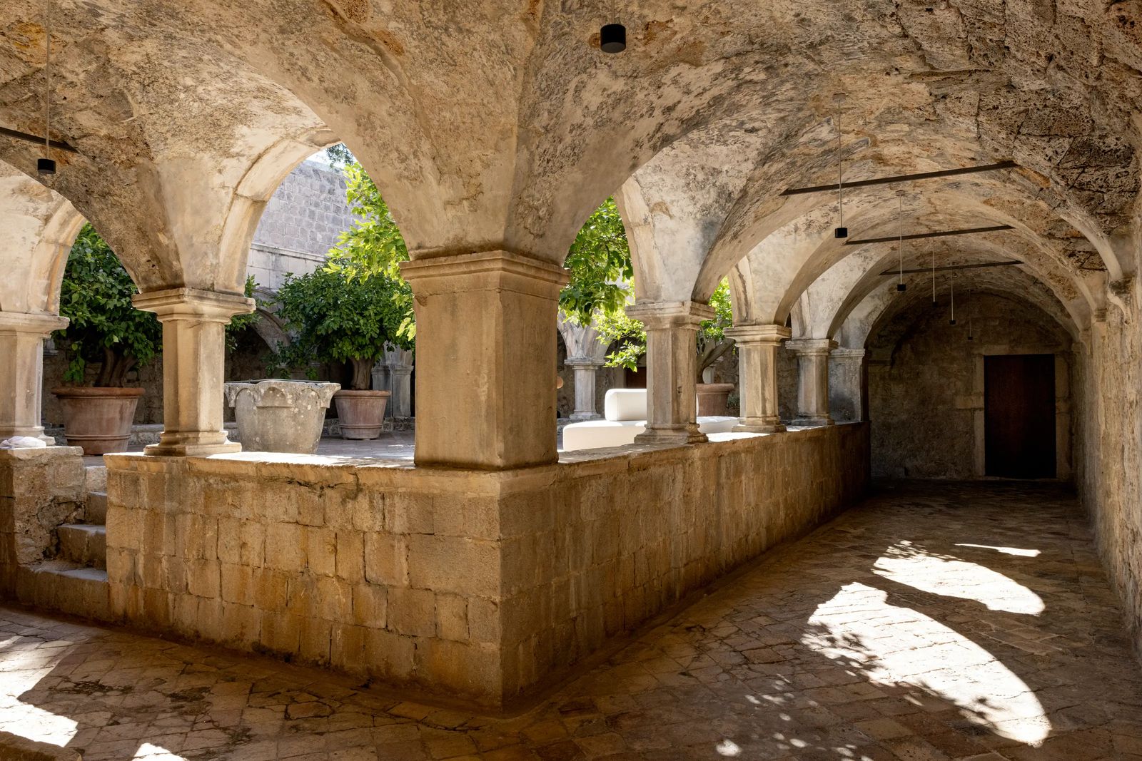 The vaulted stone spa and hammam set into the monastery's lower floor