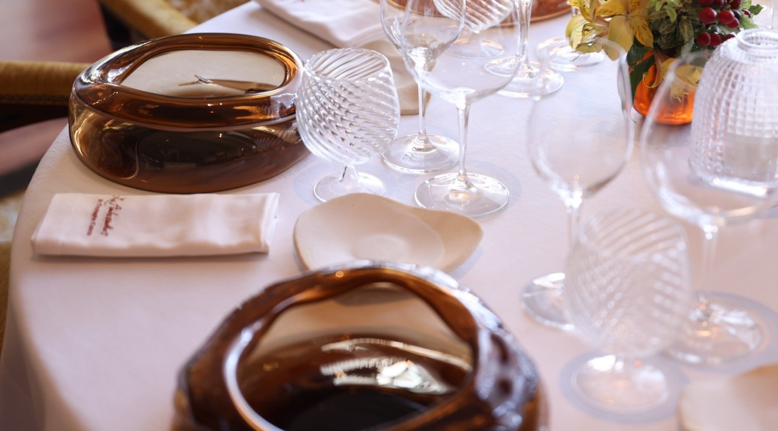 A table laid at Les Ambassadeurs by Christophe Cussac, with Murano glass and crystal