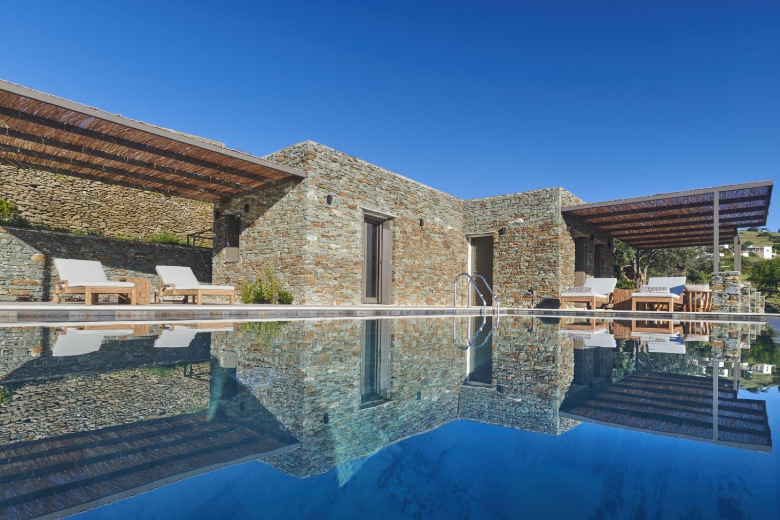 One of the two infinity pools set among the olive trees