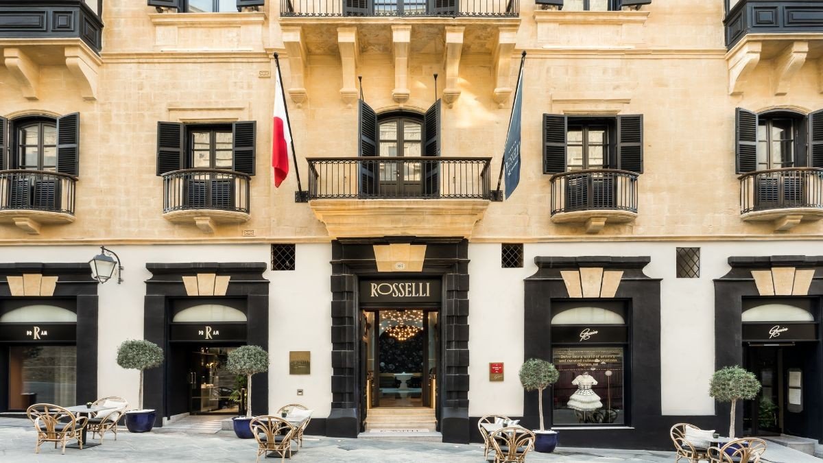 The restored Baroque facade of Casa Rosselli-Massa on Merchants Street, Valletta