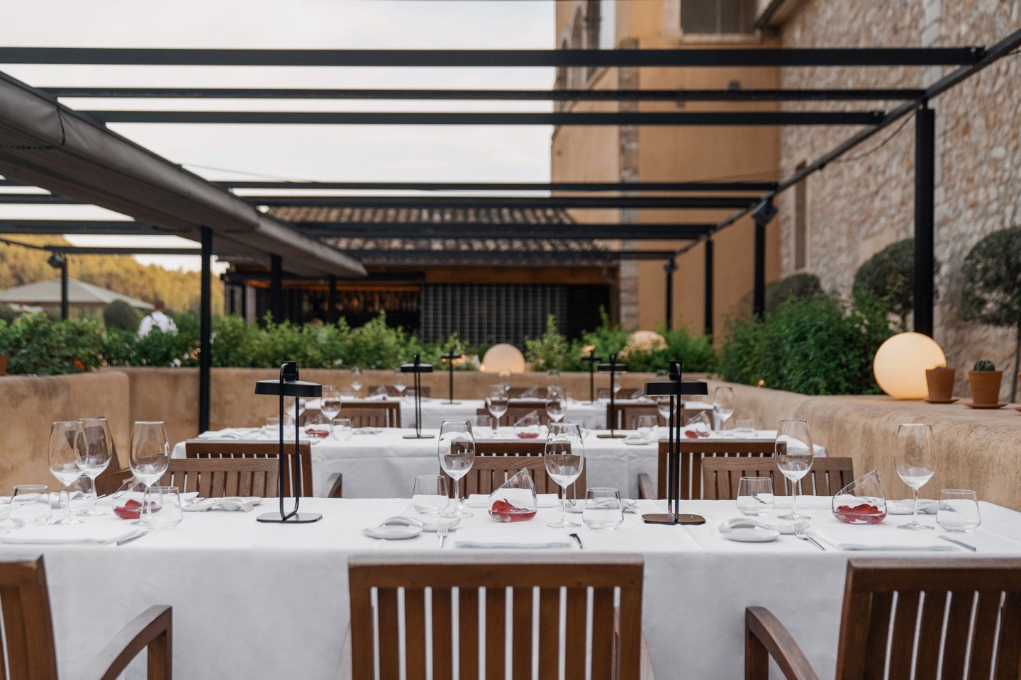 Tables laid under the pergola at the 365 restaurant