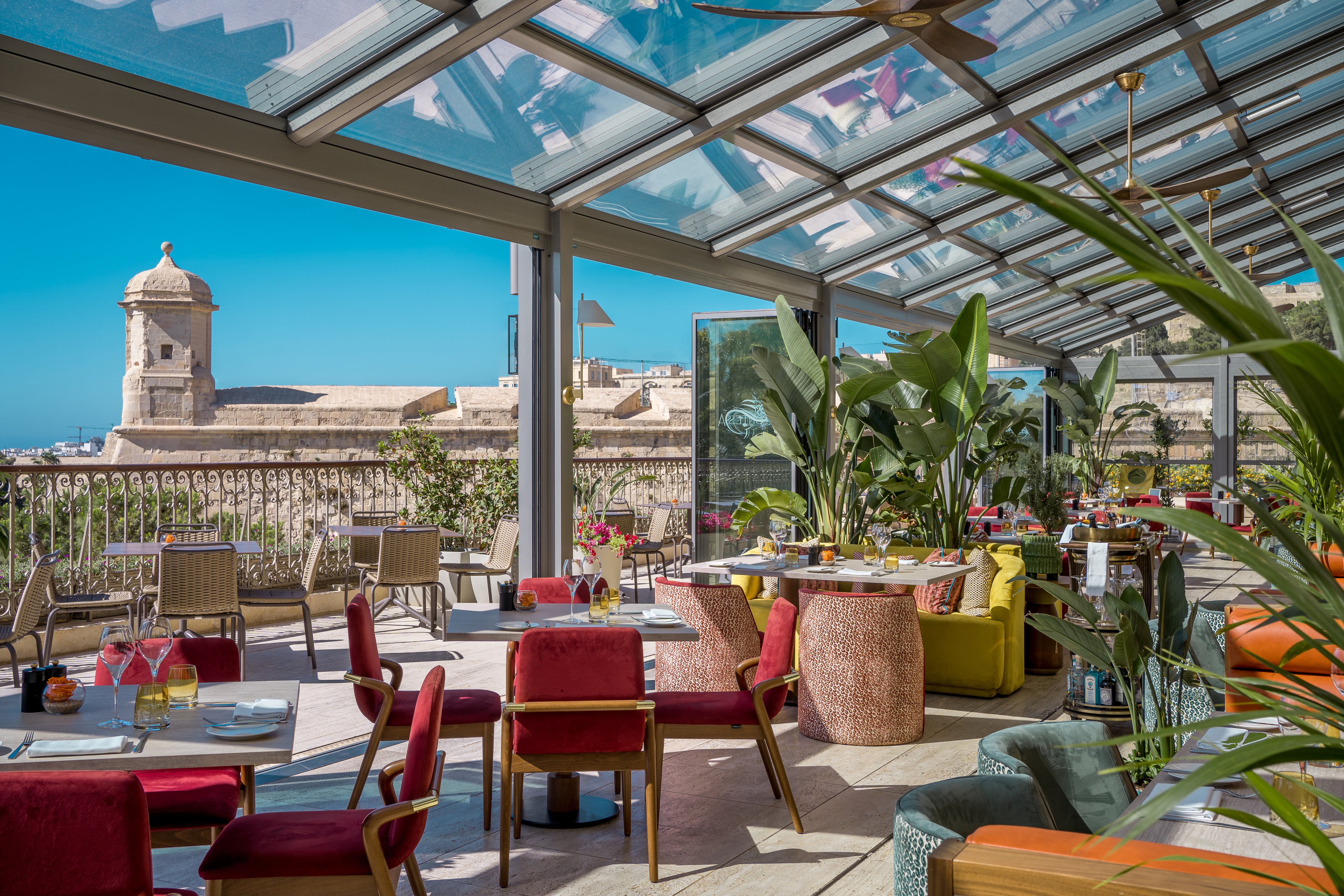 Contessa's glazed conservatory terrace looking out to the bastion and its sentry turret