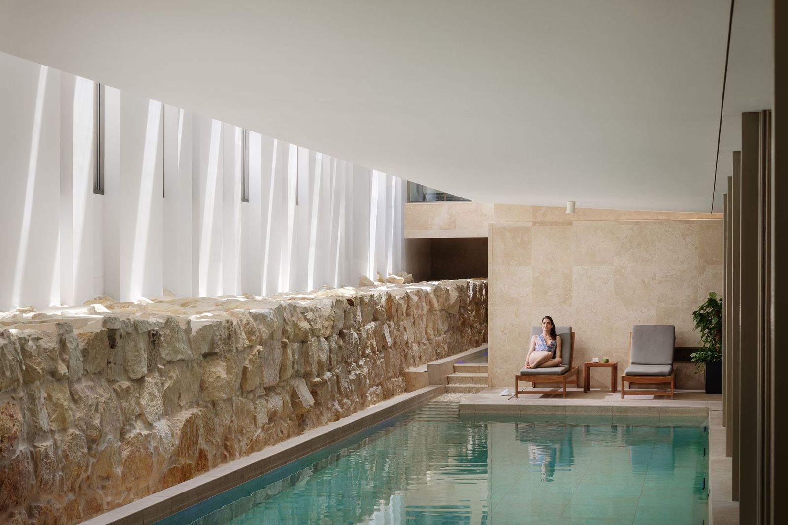 The indoor spa pool built alongside the old sixteenth-century fortification wall