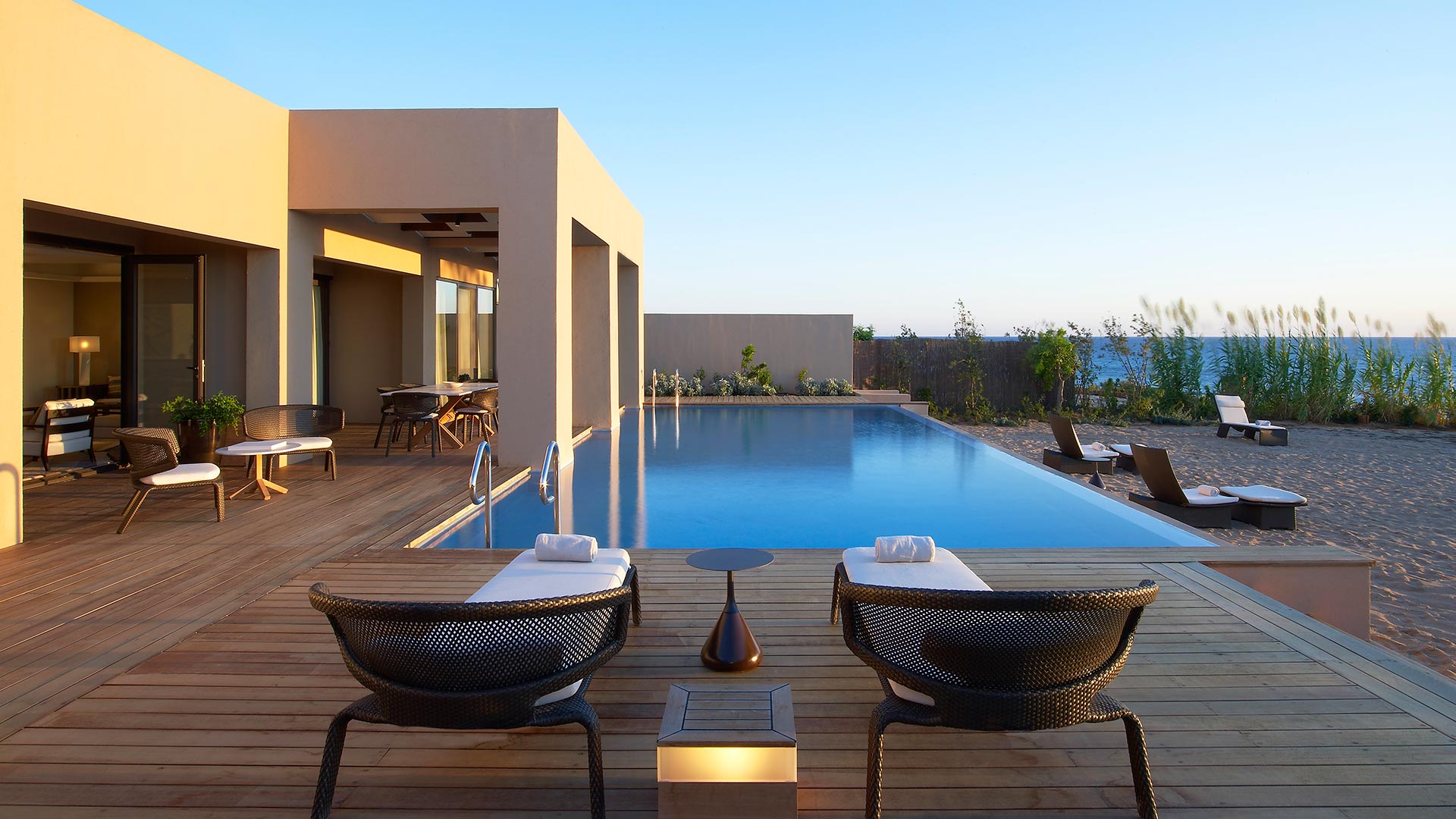 Timber deck and infinity pool by the Ionian at The Romanos